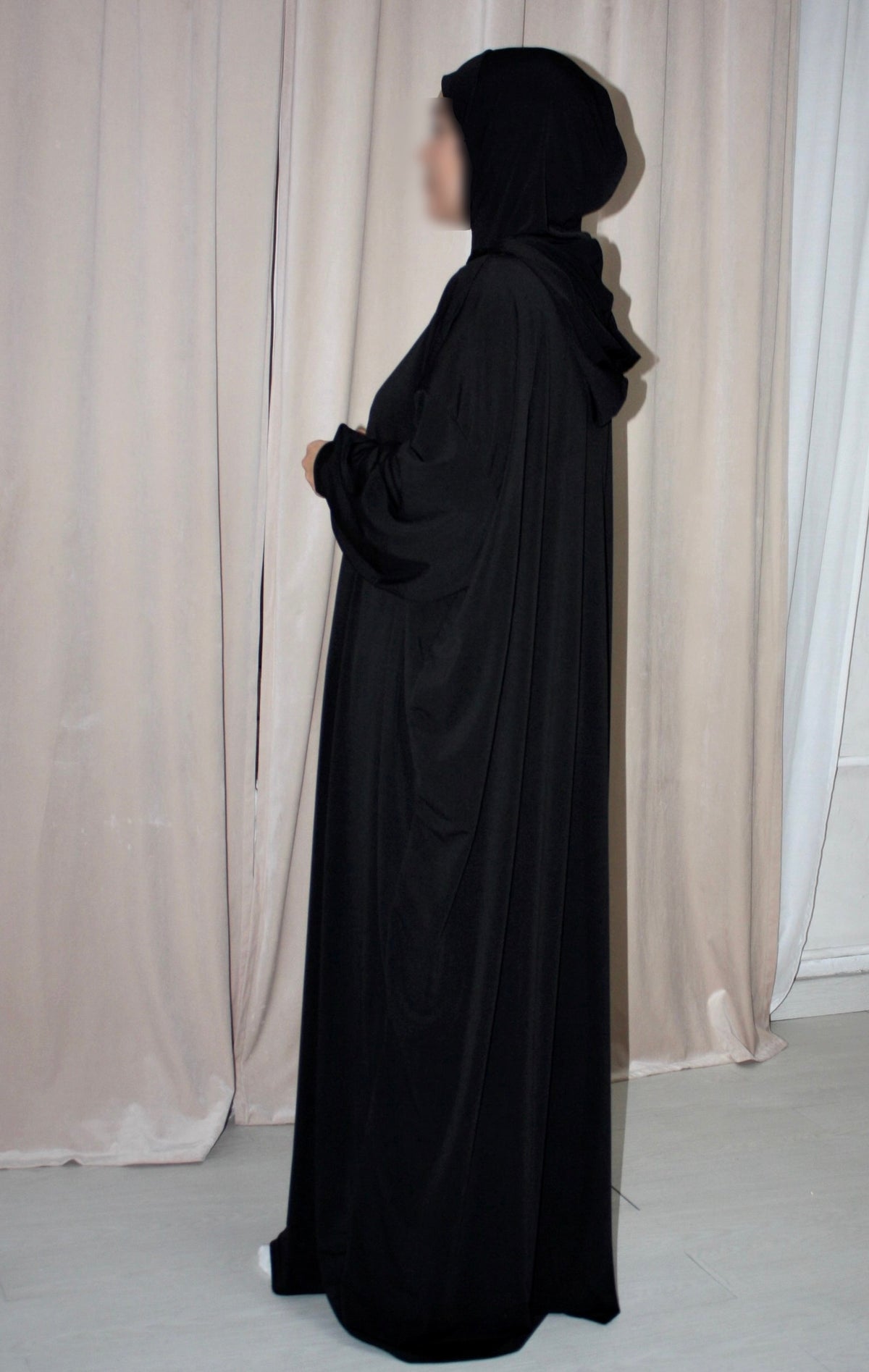 Oversized abaya with integrated hijab and hood