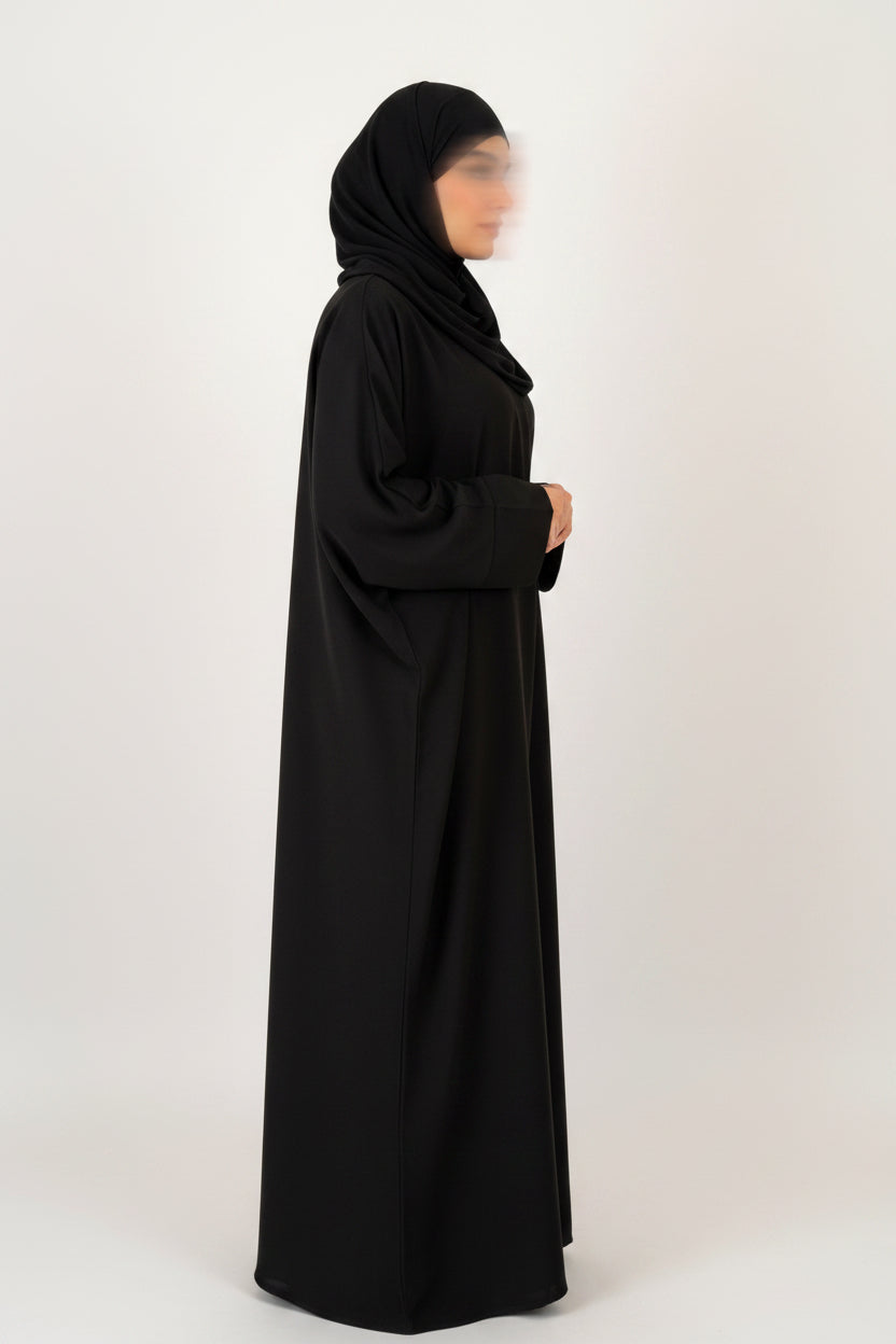 Abaya saoudienne noir vue de profil