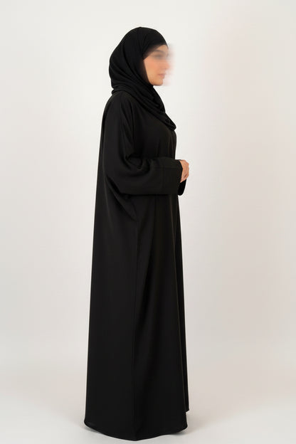 Abaya saoudienne noir vue de profil