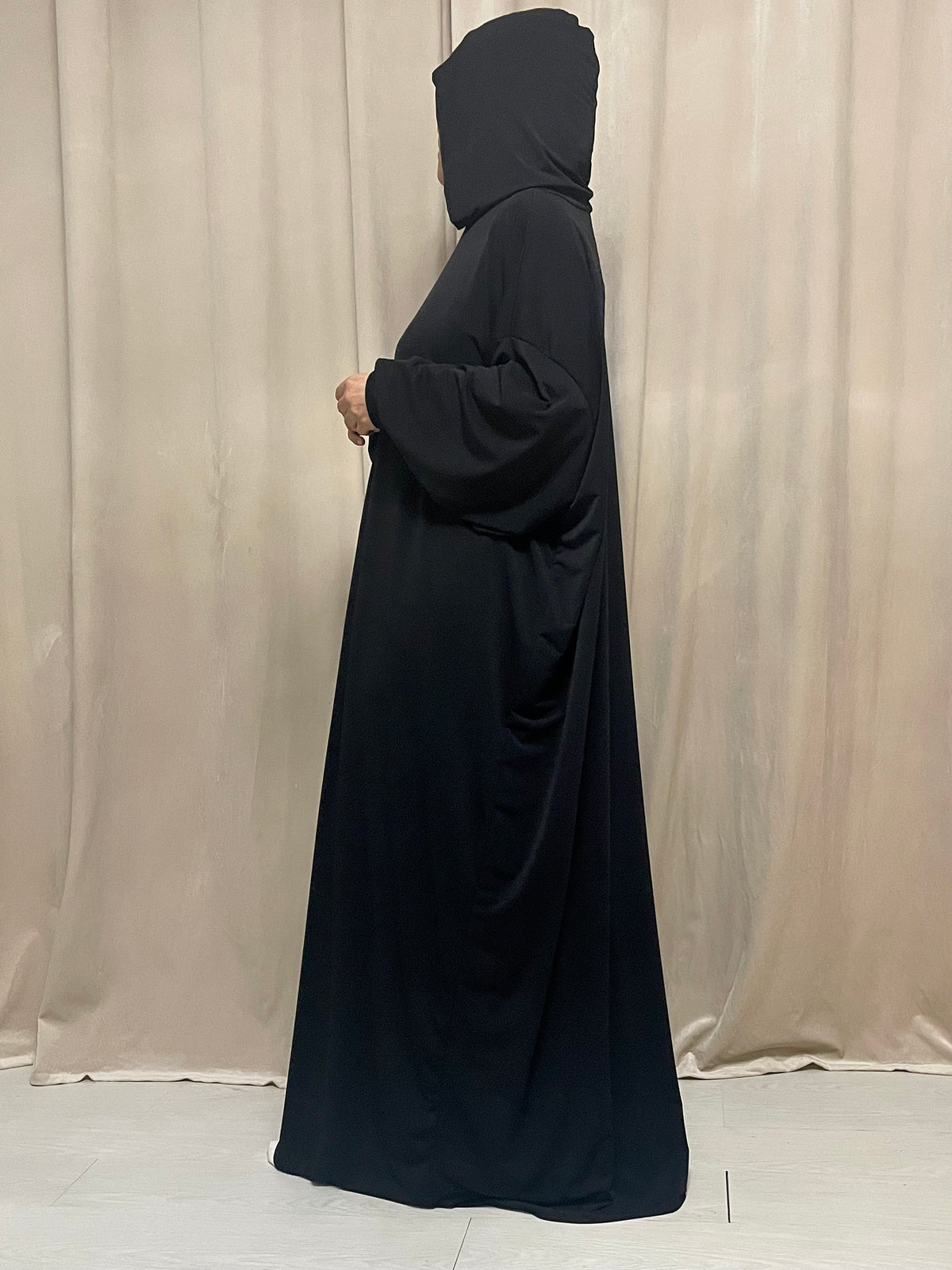 Oversized abaya with integrated hijab and hood